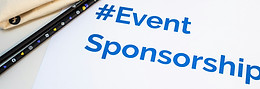 A collection of branded merch and freebies for events with the hashtag #EventSponsorship_e