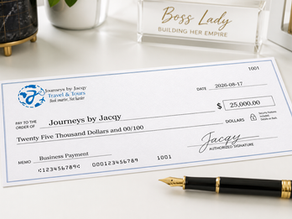Large business check for Journeys by Jacqy Travel & Tours with $25,000, dated 2026-08-17, beside a gold pen and Boss Lady sign.