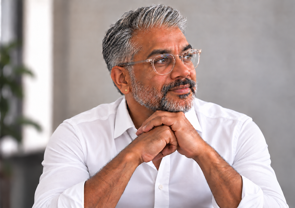 Jazz Dhillon, founder of Xpand Telemarketing & Consultancy, seated in a professional setting