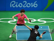 Mid rally in the table tennis event