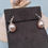 Thumbnail: Pink hanging pearl earrings