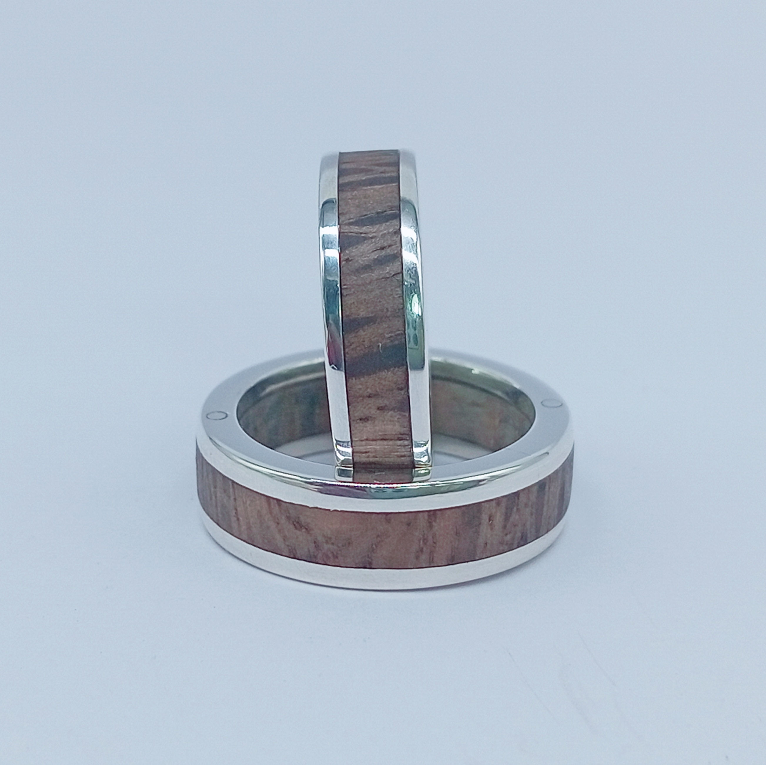 Silver and wood band ring.