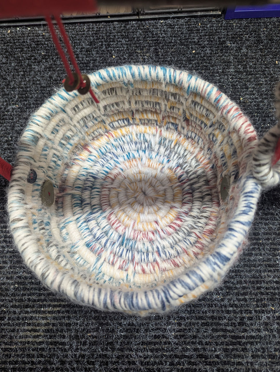 Thumbnail: Hand-coiled variegated yarn basket with Driftwood Handle by Amy Matsumoto
