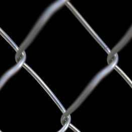 front view galvanized chain link fence with black background.jpg