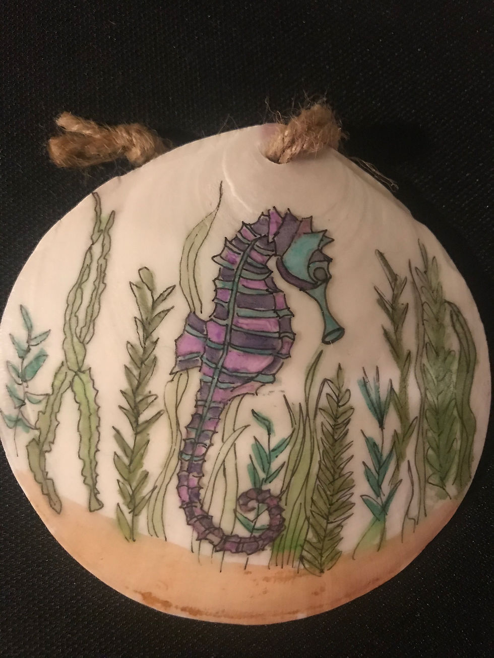 Teal and purple seahorse