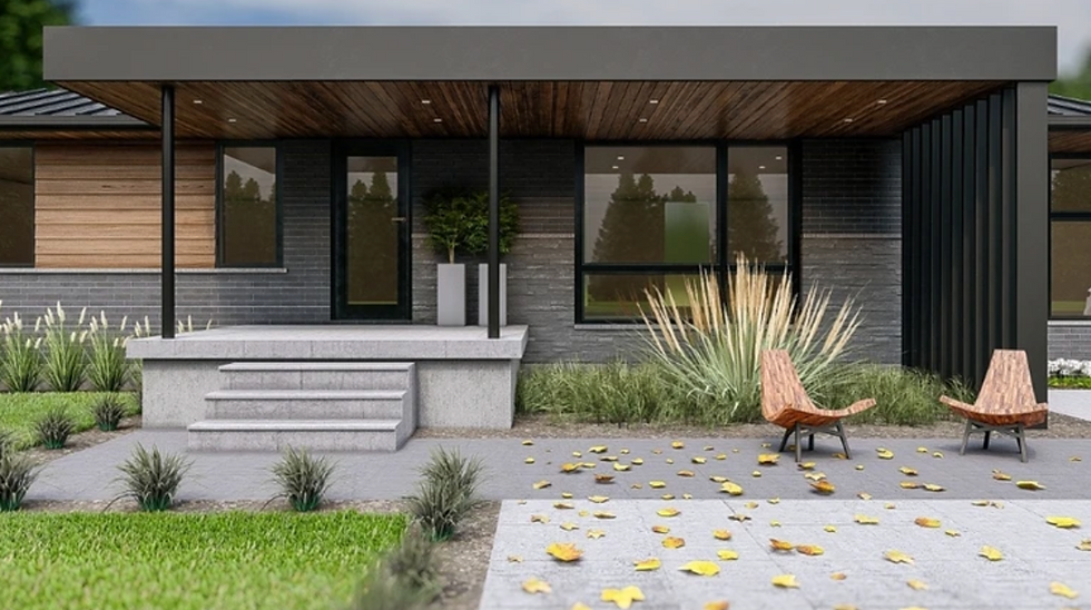 Modern house exterior with wood and brick facade, porch steps, and two wooden chairs. Yellow leaves scattered on patio, greenery surrounds.
