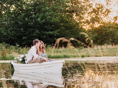 An engaged couple on the water at Hope Springs Farm Springfield MO