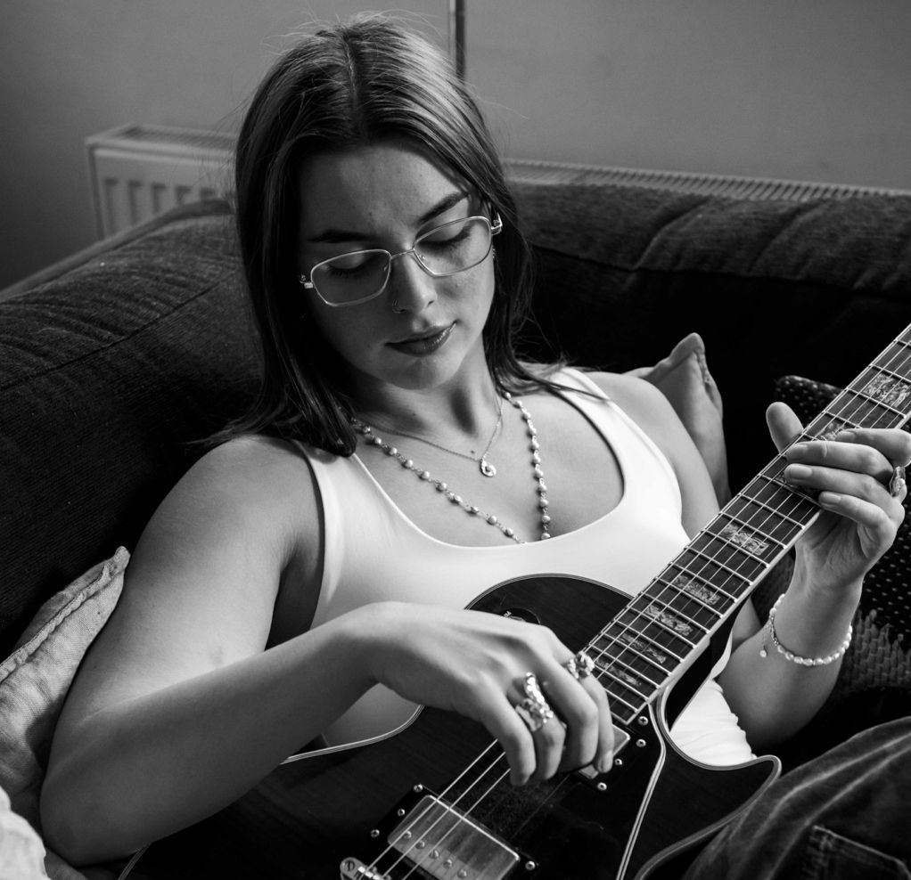 Zoe Freed with electric guitar