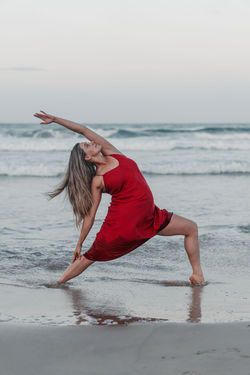 yoga pose on beach