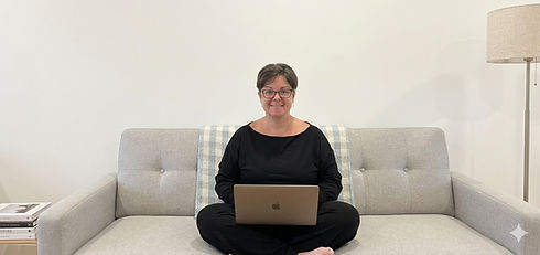 Me sitting on my sofa with my laptop_edited.jpg