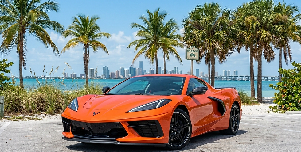 Wide angle view of a Corvette convertible cruising along Miami’s coastal highway