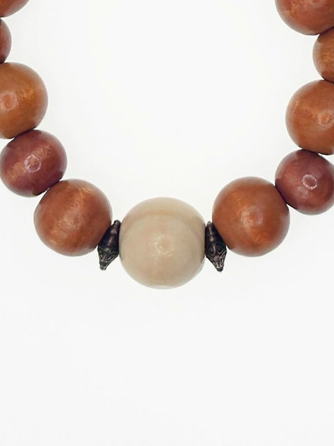 African Wood Stretchable Bracelet With Charm closeup
