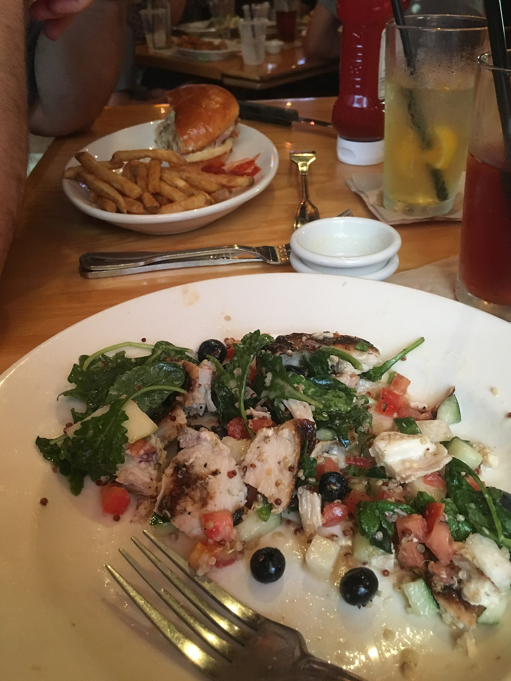 Quinoa and fruit salad versus fried chicken sandwich