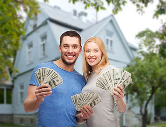 17478-Couple with cash in front of house.jpg