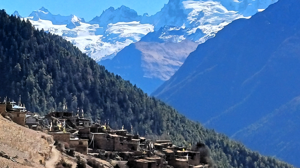 stone houses of Ghyaru village and the view of himlayan