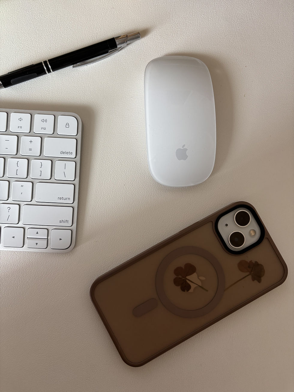 Apple Phone sitting screen side down on work desk