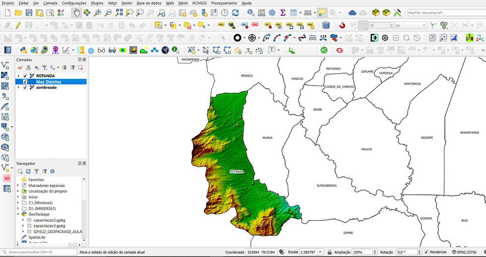 Eye-level view of a GIS analyst working on a computer with environmental maps