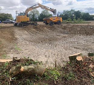 Digger creating a new pond