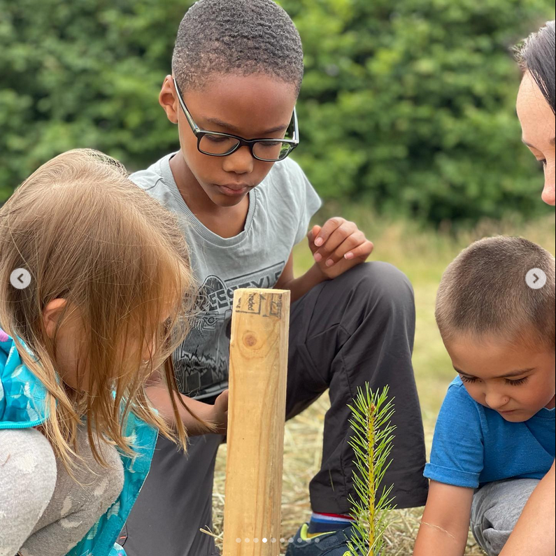 Children planting tree