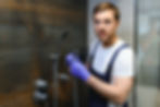 professional-handyman-working-in-shower-booth-indo-2023-11-27-04-56-12-utc.jpg