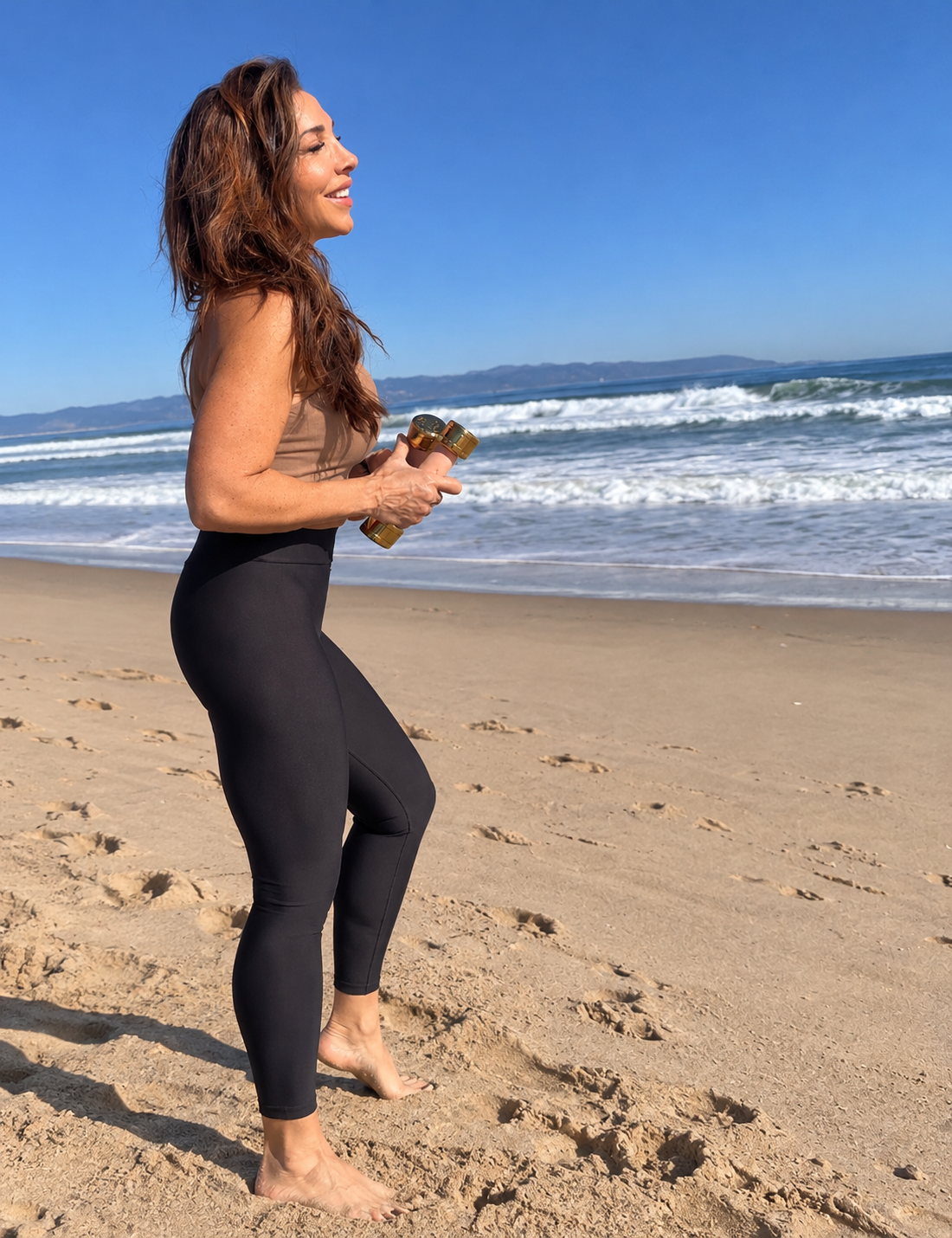 Angela Amiri training on the beach