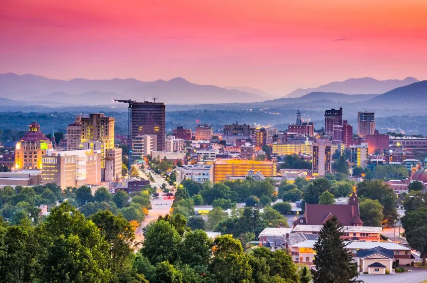 Downtown-Asheville-Skyline-by-Sean-Pavone-e1577814857862.jpg.webp