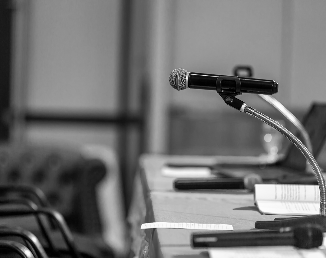 microphone-in-conference-room-black-and-white.png