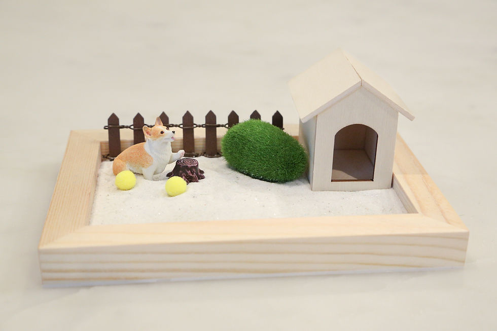 Thumbnail: Corgi dog figurine with a dog house on a wooden tray setting