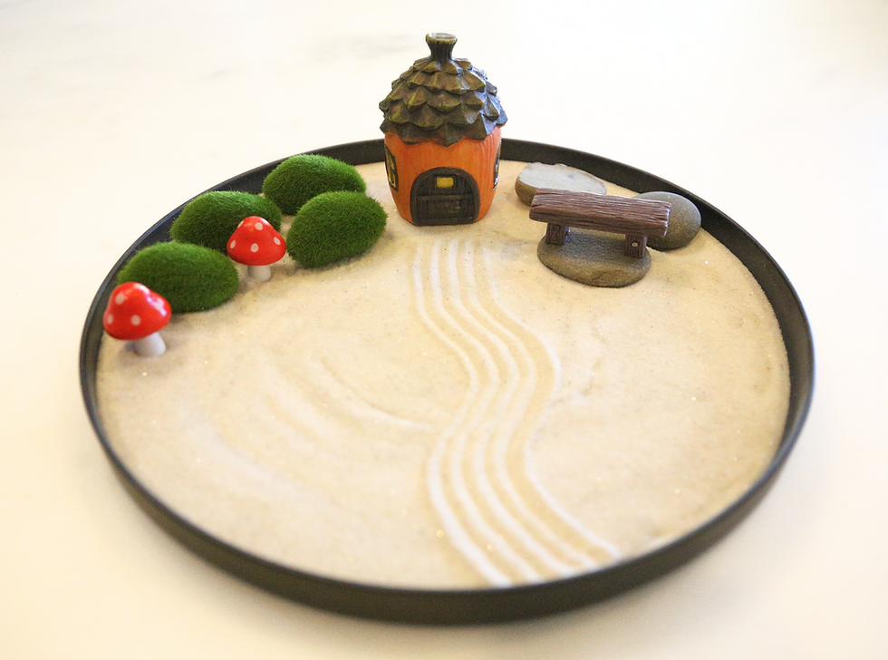 Thumbnail: Miniature zen garden with house, mushrooms
