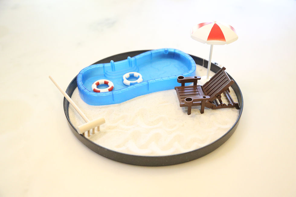 Thumbnail: Miniature pool zen garden with rake