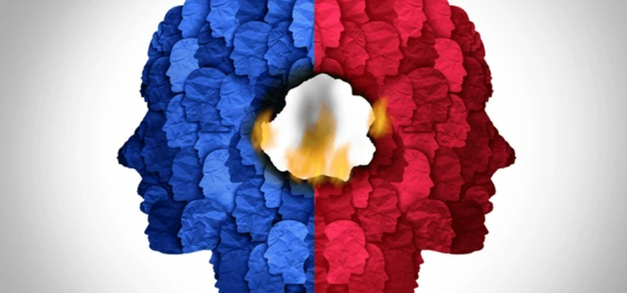 “Divided workplace culture concept blue and red human profiles clashing with fire in the center, symbolizing toxic conflict in organizations.”