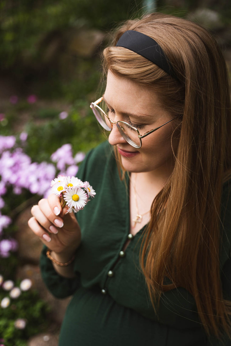 Mom with a white flower long hair in Malaga garden