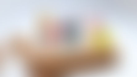 Construction worker figurines on a biscuit