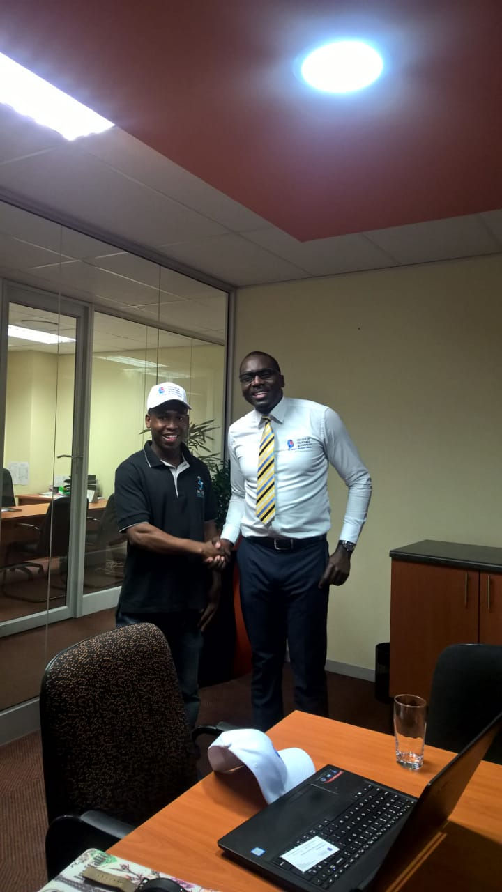Left, Mr Thabo Seete the CEO of MASA giving hand shake to the COCA CEO.
