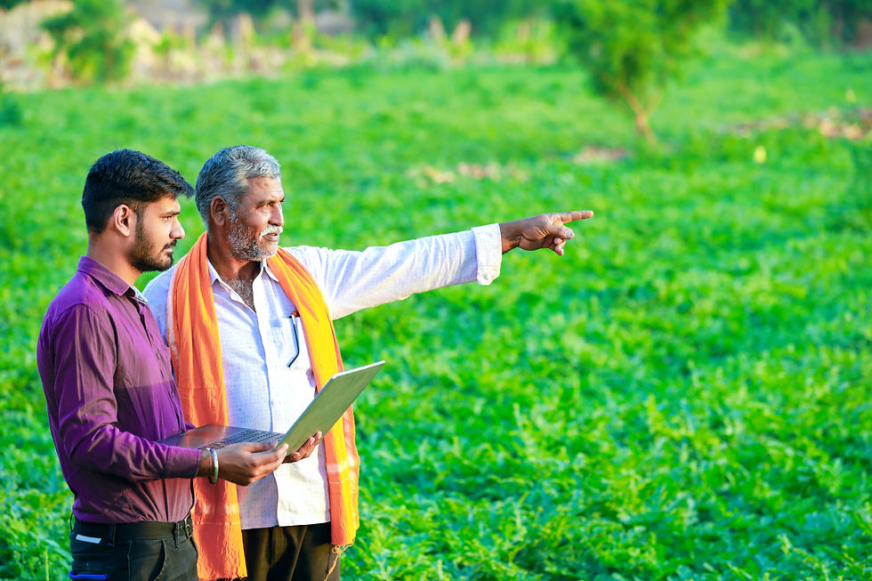 indian-agronomist-with-farmer-field (1).jpg