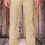 Thumbnail: Khaki pants against wood background