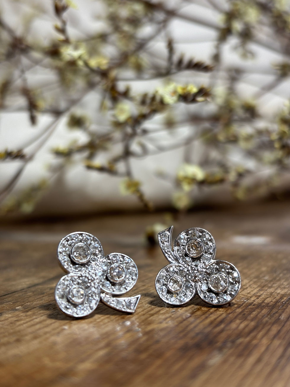 Thumbnail: A pair of early 20th century diamond cluster earrings