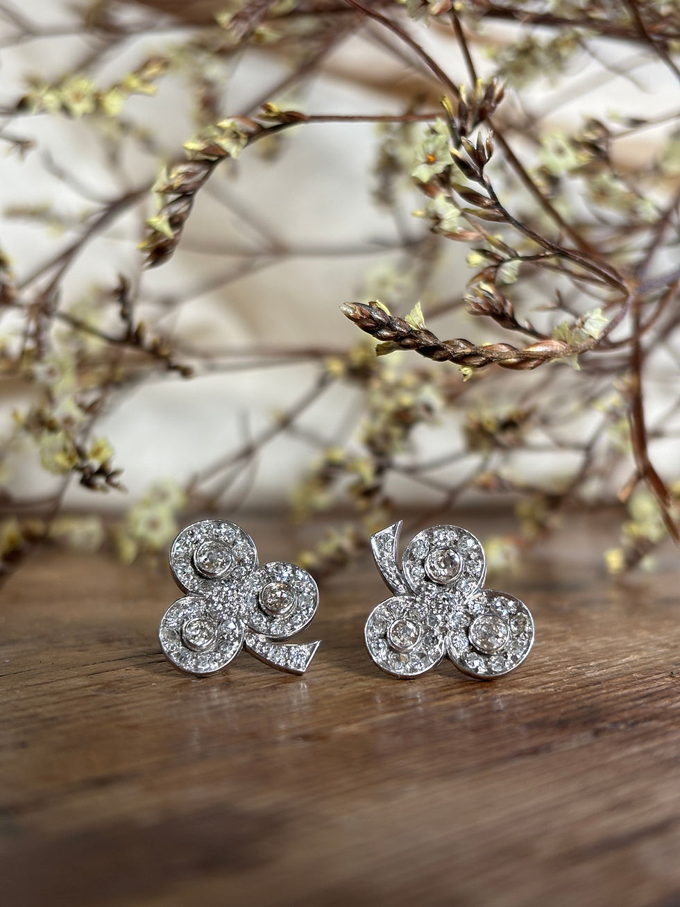 Thumbnail: A pair of early 20th century diamond cluster earrings