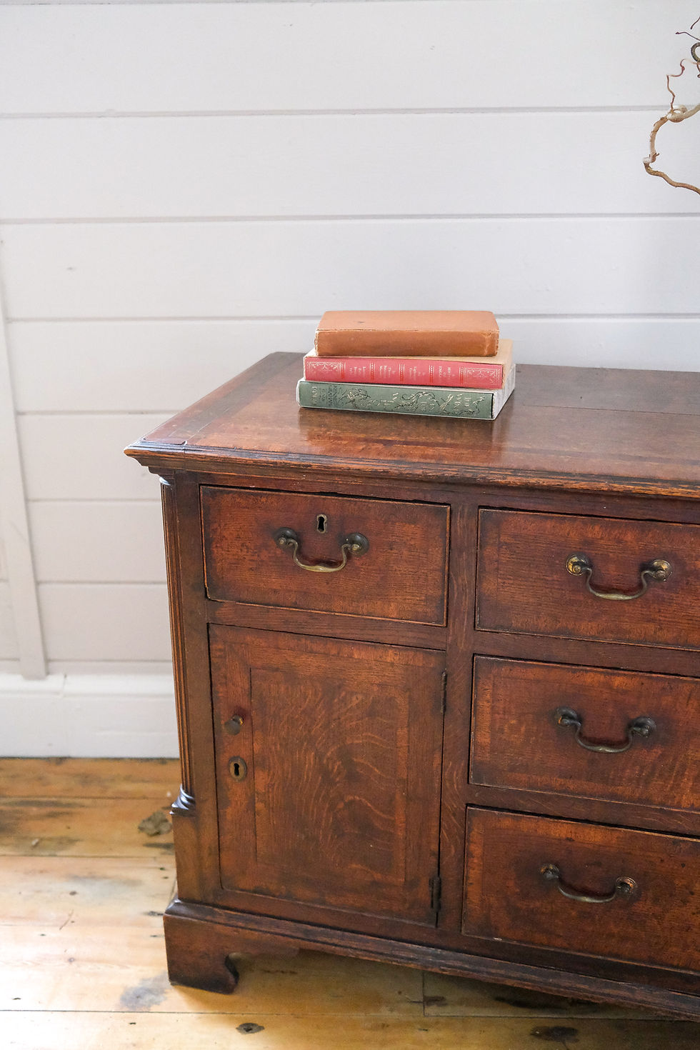Thumbnail: A George III oak and mahogany-banded low side cabinet, late 18th century