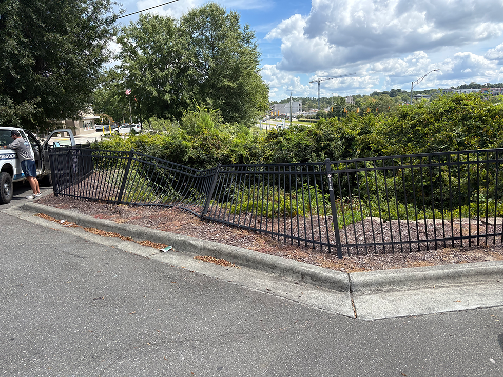 Black Aluminum Fence in Need of Repair