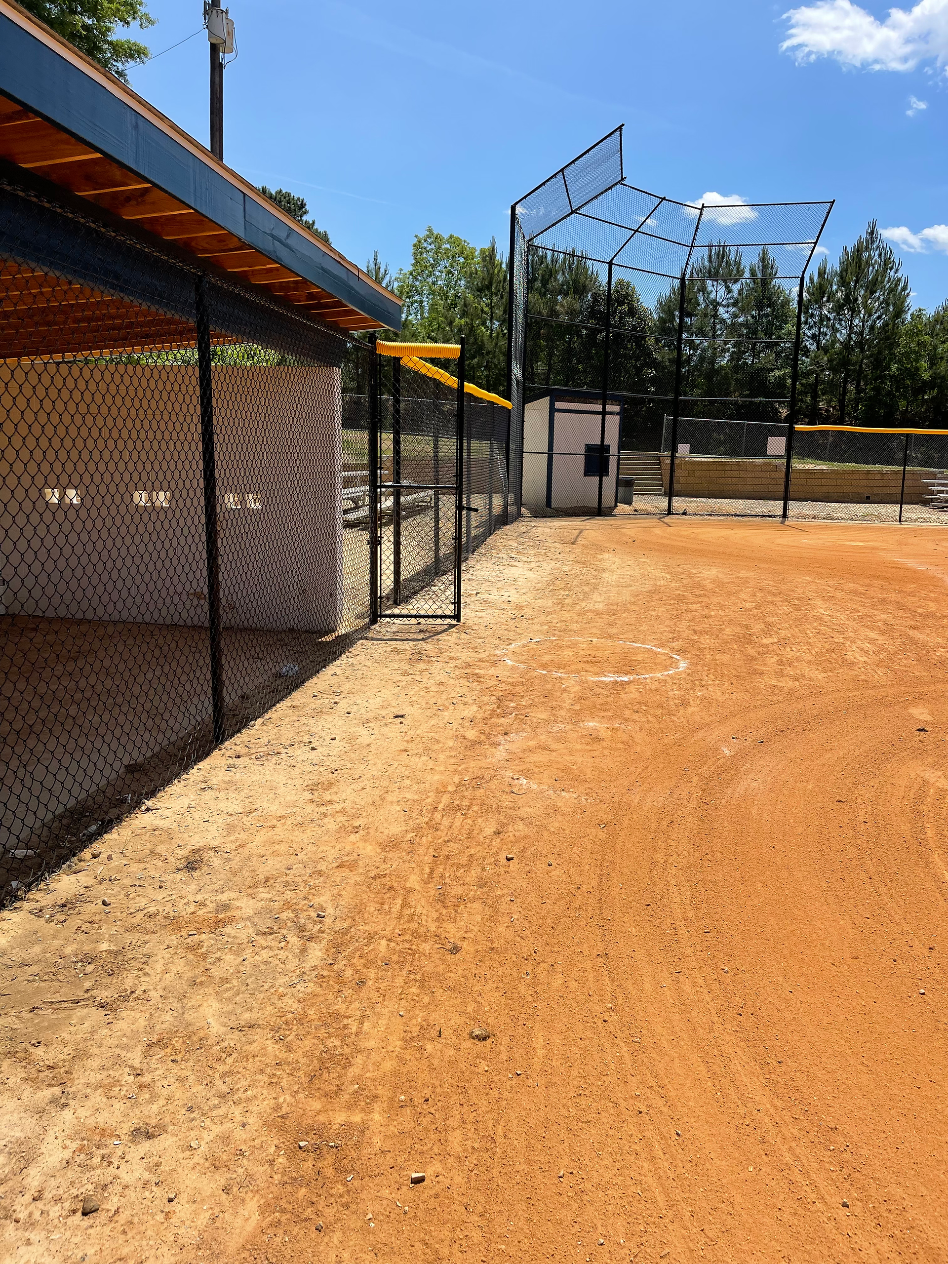 Black Chain Link Fence Around Dugout