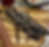 Dark vanilla beans on a wooden cutting board