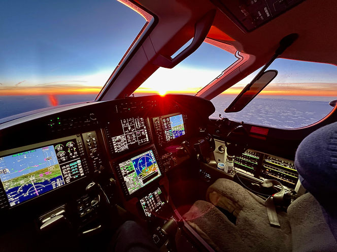 pc12-cockpit-sunset.jpeg