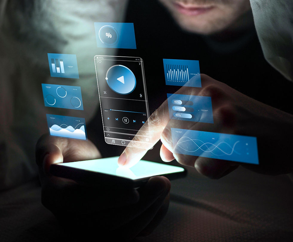 Close-up of a person interacting with a futuristic smartphone interface showing holographic app elements and data visuals.