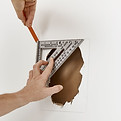 repair holes in wall. drywall repair