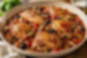 Chicken cacciatore in a Dutch oven with bone-in chicken thighs, peppers, mushrooms, and olives in a rich tomato sauce