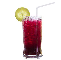 Berry drink in a glass with a straw