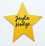 Gold star that says Jayla Hodge in the middle in black cursive writting.jpg