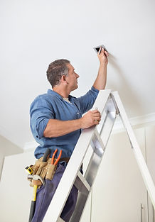 Man Fixing Ceiling