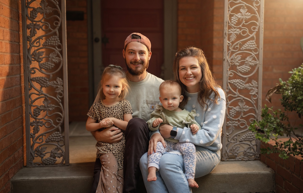 Chris and family on front porch